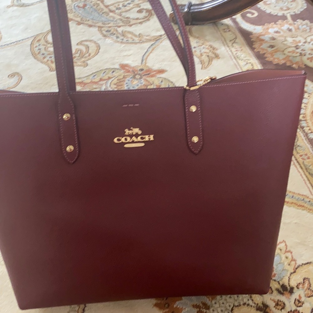 Coach Tote.  Burgundy/Red outside, pink inside.  Brand new.  Never used.